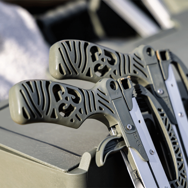 Close-up of a litter picker with a focus on the handle and shaft.