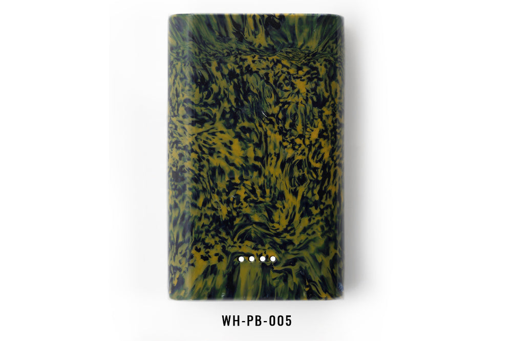 Marbled green and black power bank on a white background