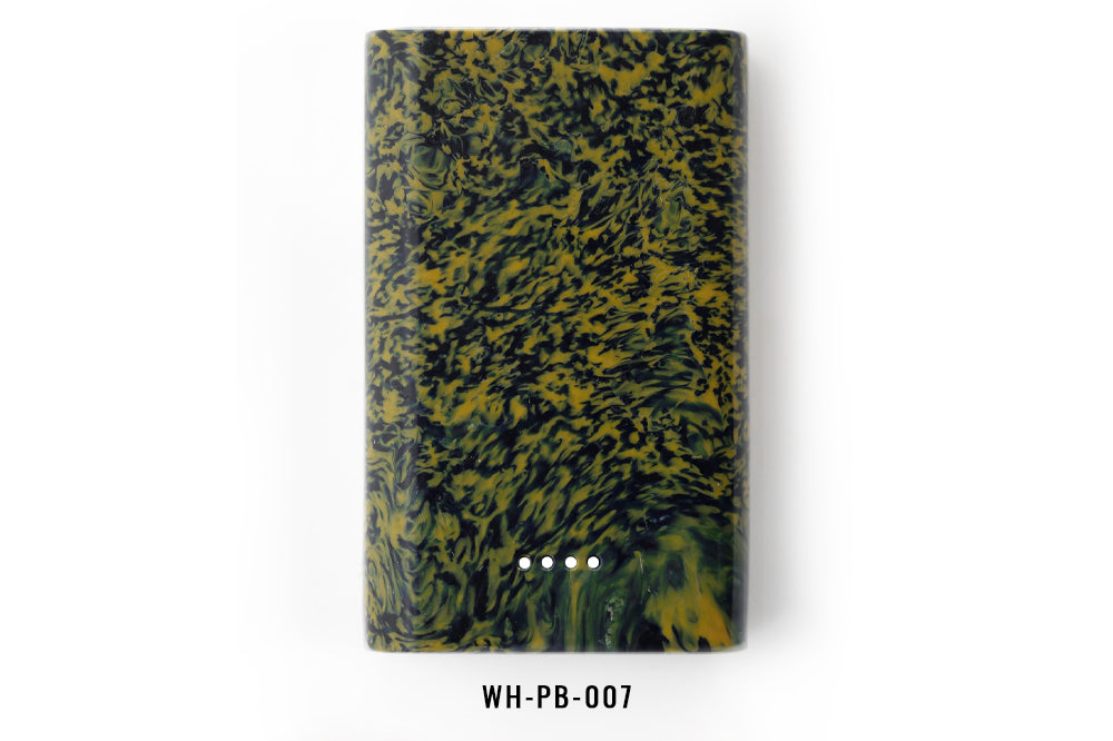 Marbled green and black power bank on a white background